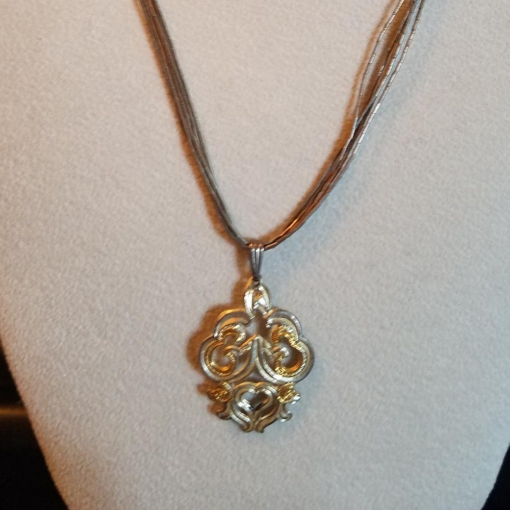 Gold and silver necklace pendant with chain